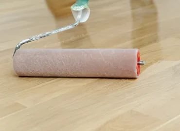Applying a protective finish to hardwood