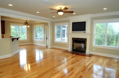 Hardwood flooring in a sunlit open-plan home