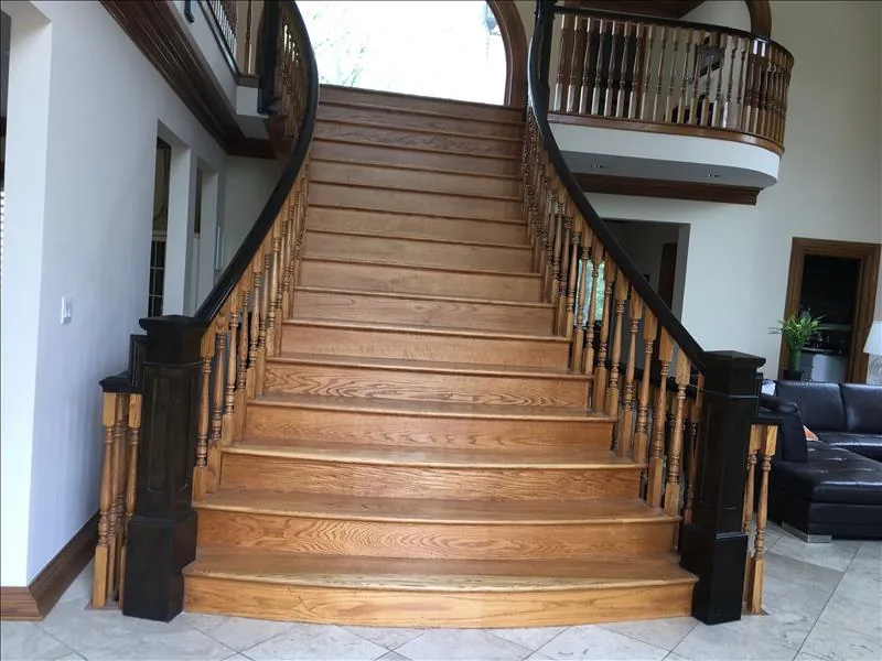 Wood stair treads leading to an upper landing