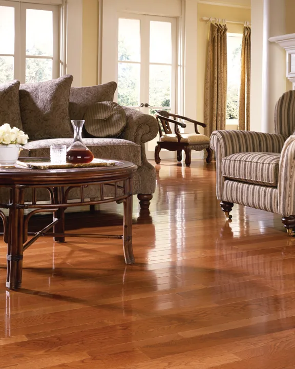 Warm wood flooring in a traditional sitting room