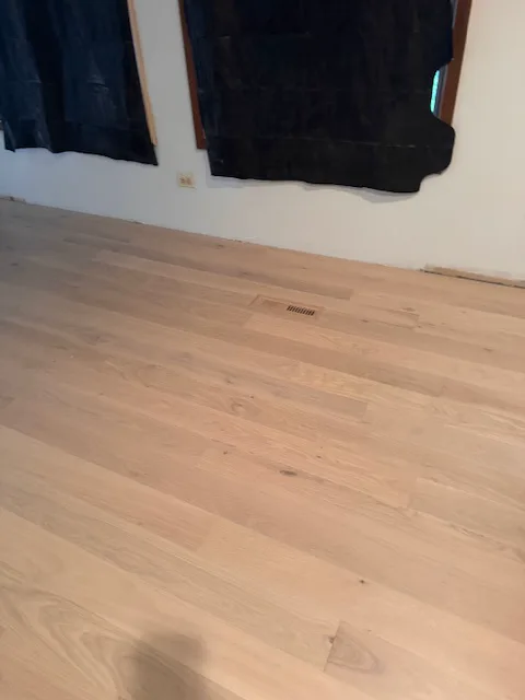 Newly installed wide white oak planks